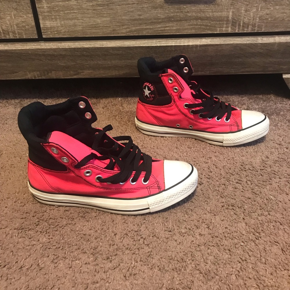 Neon pink and black hi top converse